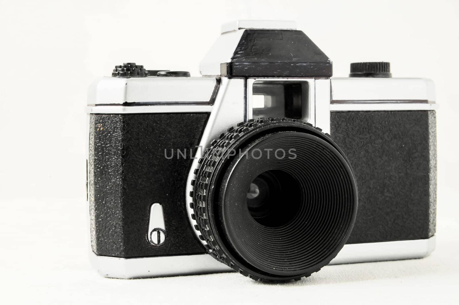 Classic 35mm Plastic Toy Photo Camera on a White Background