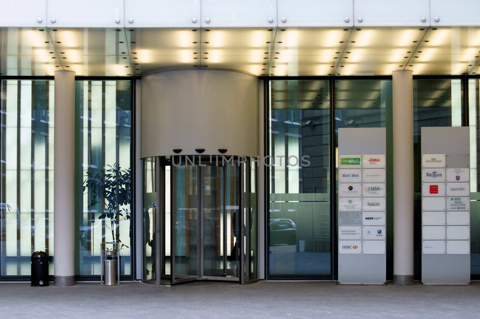 Frankfurt,Germany – February 19,2014: The entrance of an office building with a revolving door on February 19,2014 in Frankfurt.