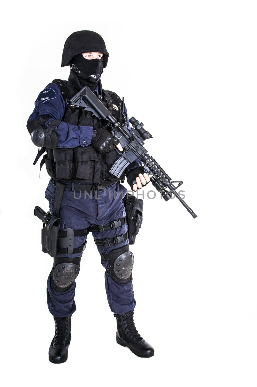 Special weapons and tactics (SWAT) team officer with his gun