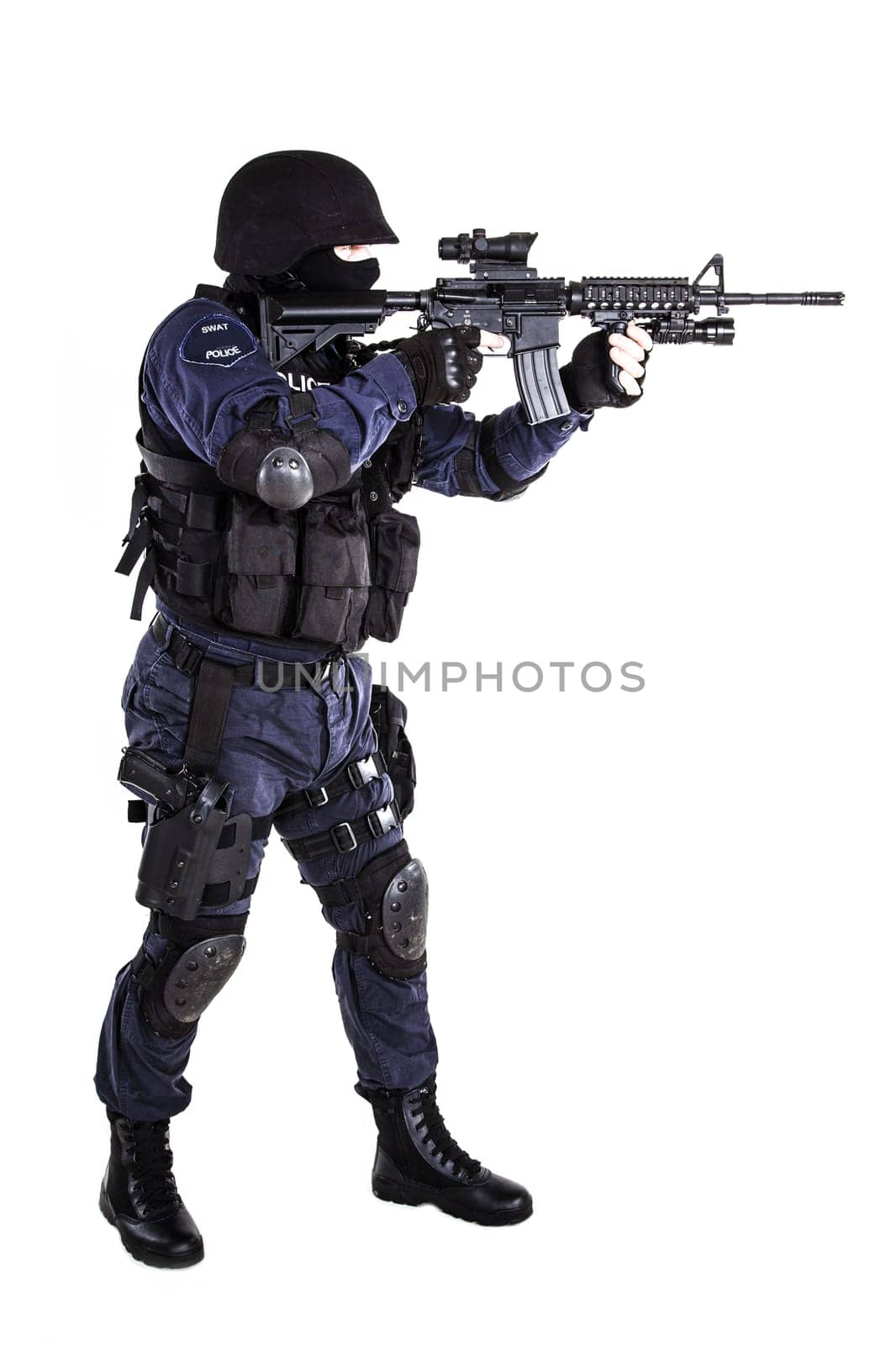 Special weapons and tactics (SWAT) team officer with his gun