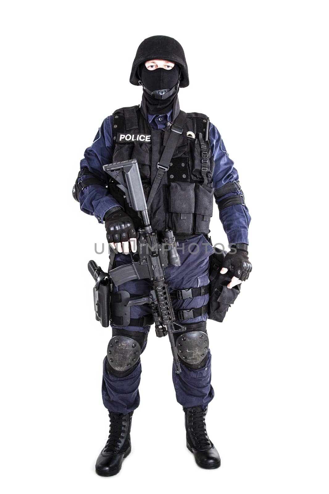 Special weapons and tactics (SWAT) team officer with his gun