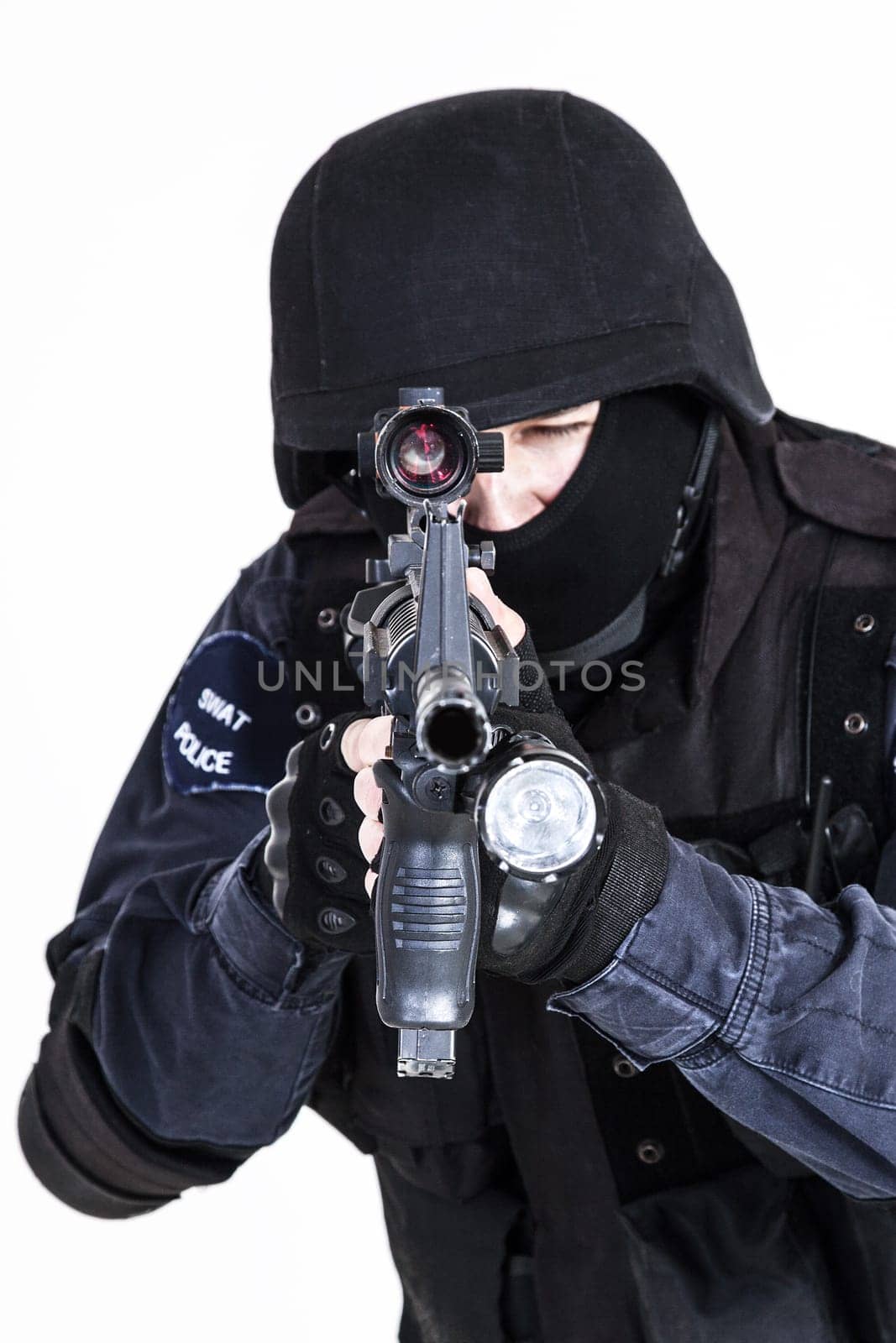 Special weapons and tactics (SWAT) team officer with his gun