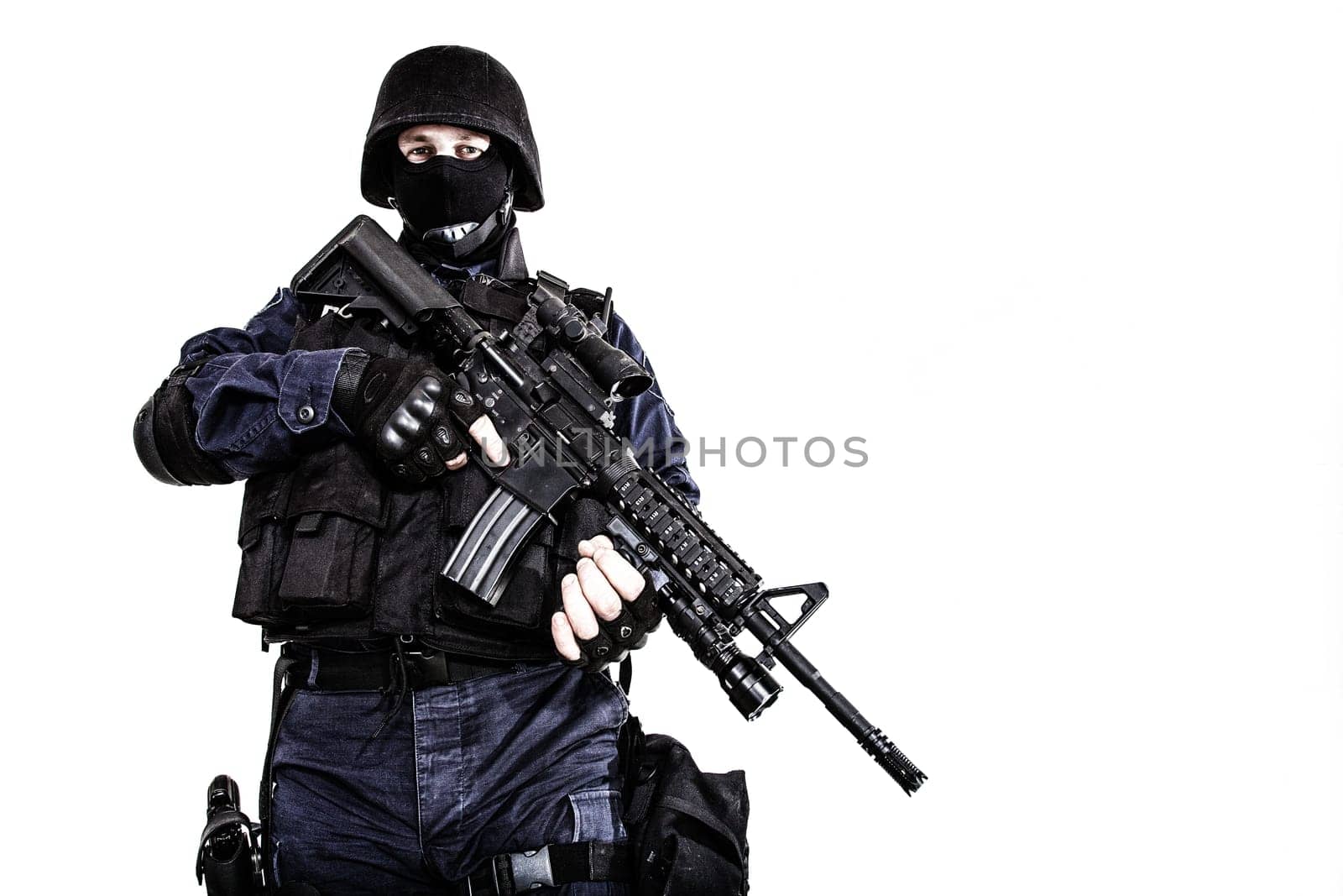 Special weapons and tactics (SWAT) team officer with his gun