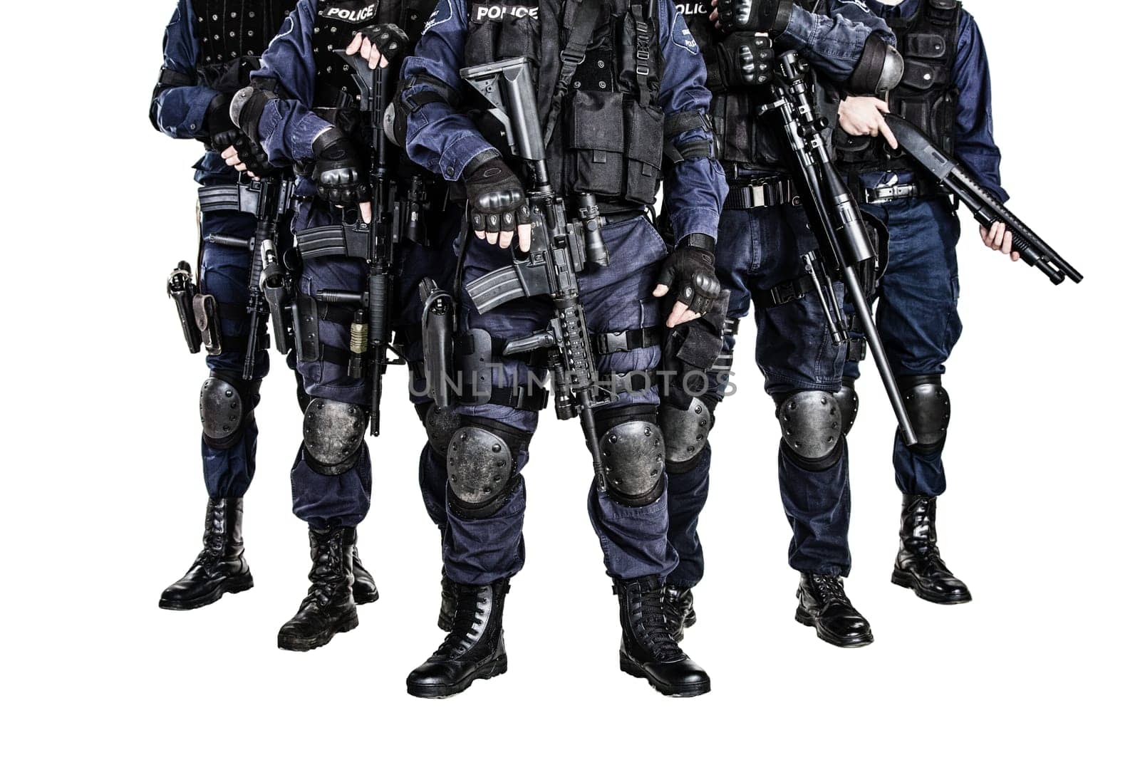 Special weapons and tactics (SWAT) team officers with guns