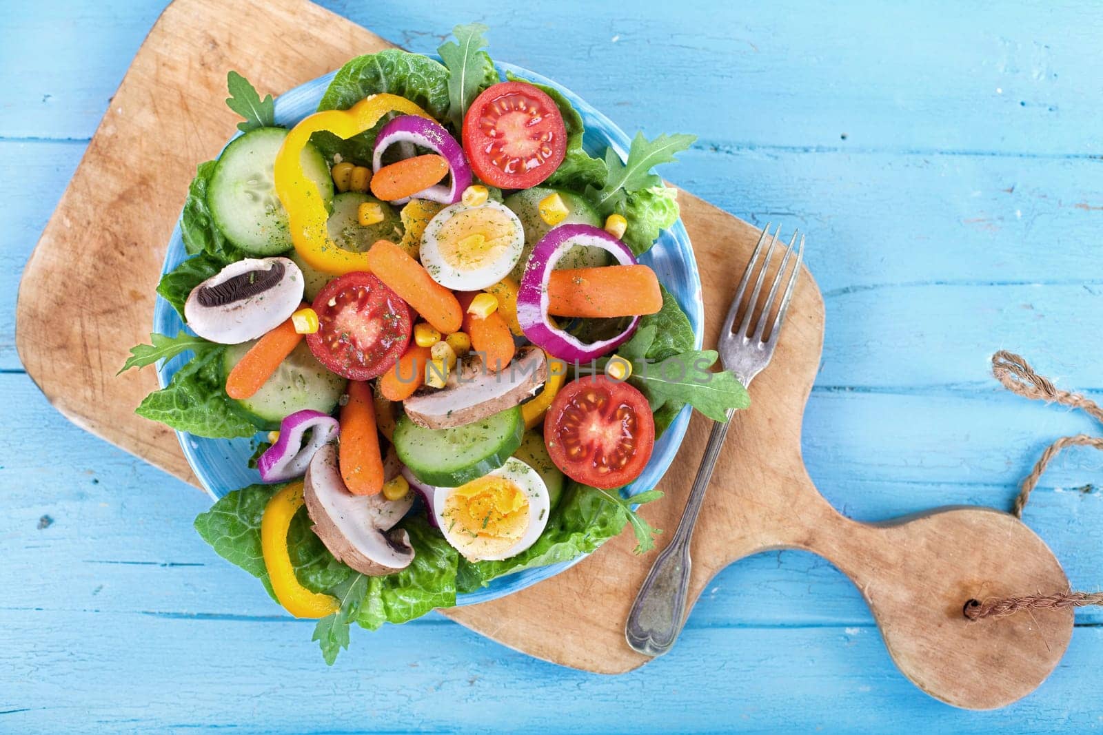 Fitness salad on rustic wood