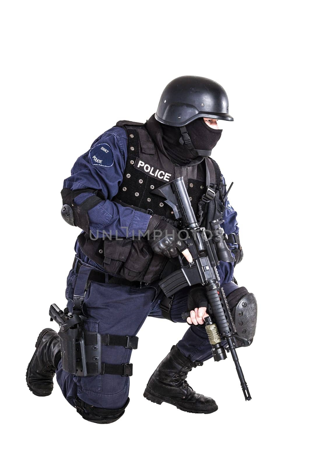 Special weapons and tactics (SWAT) team officer with his gun