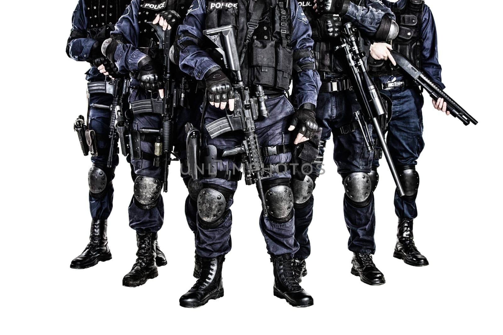 Special weapons and tactics (SWAT) team officers with guns