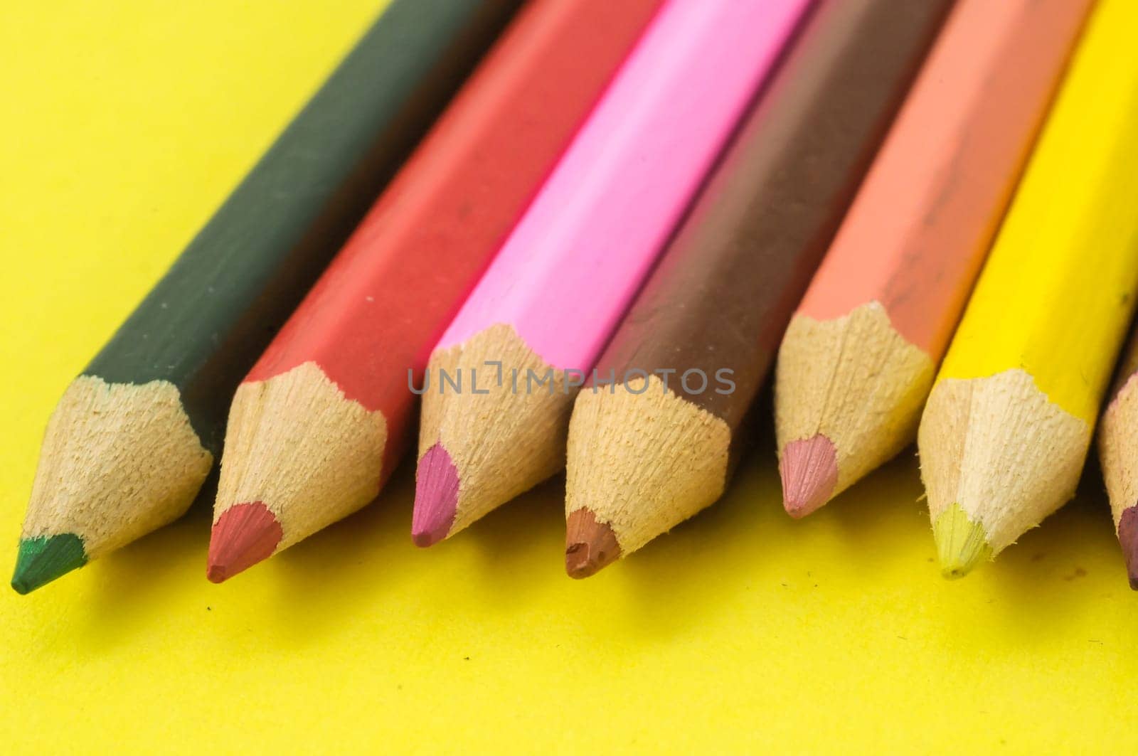 New Pencils Textured Set on a Colored Background