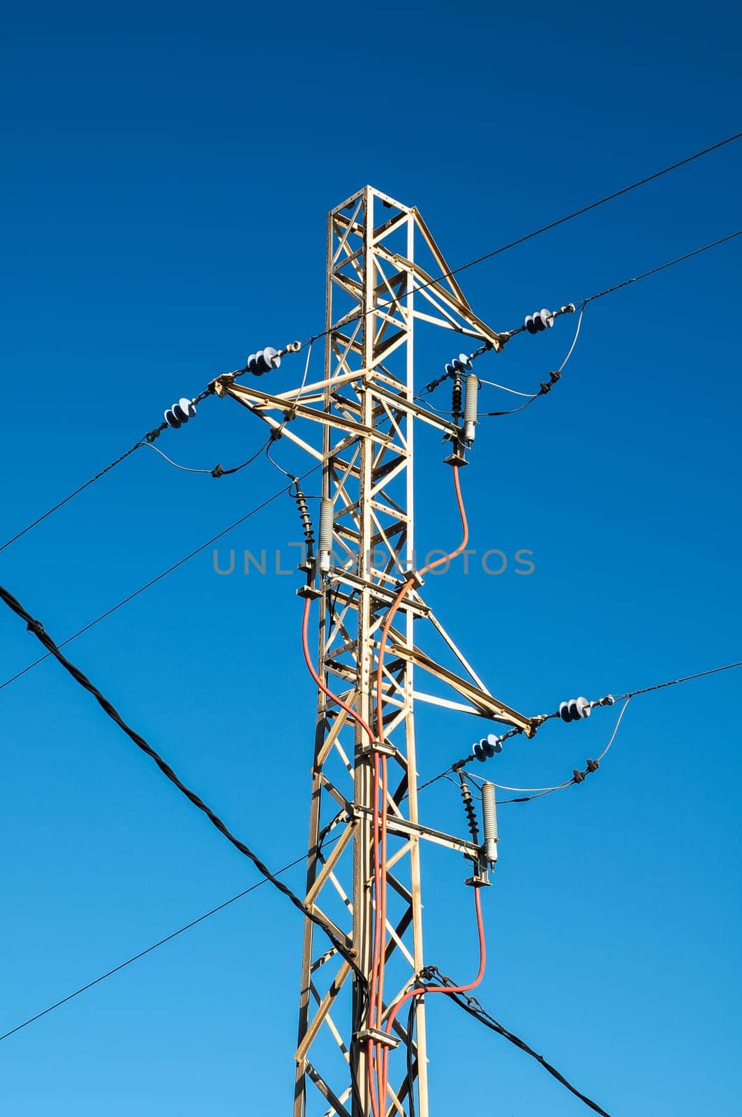 Energy Electricity Power Pylon on a Blue Sky