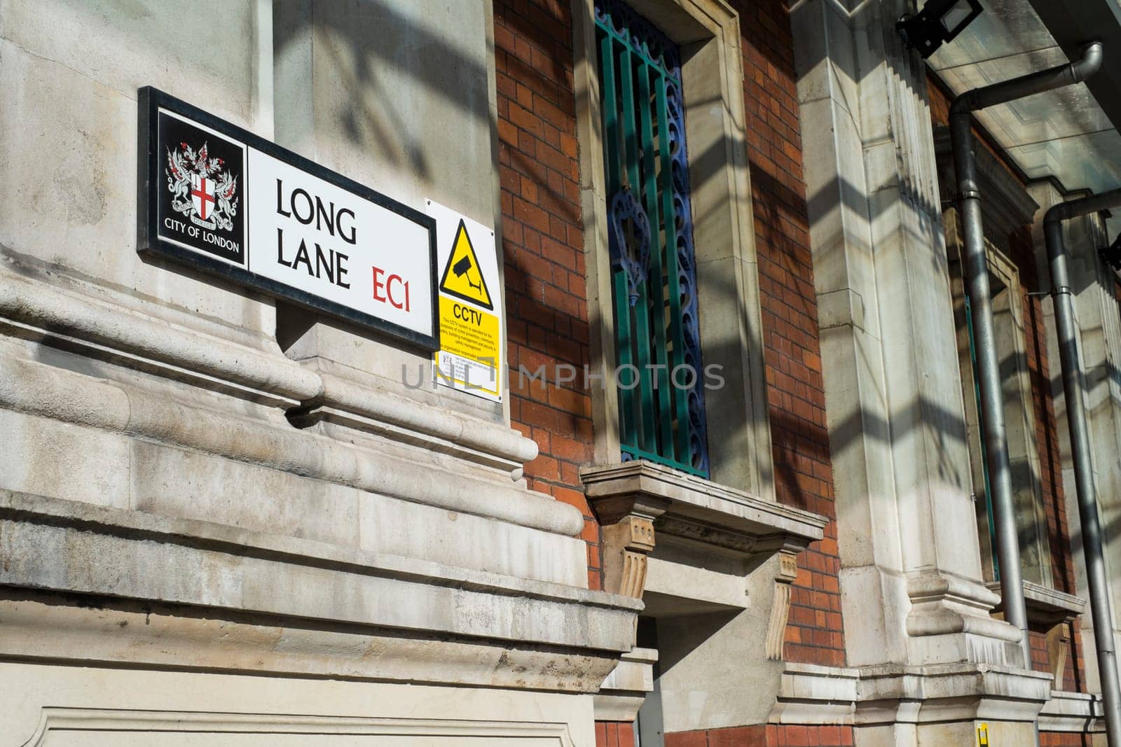 LONDON, UK - FEBRUARY 16: Detail of street signs in Smithfield meat market.The building is over one hundred and forty years old, but the market has been in the same site for almost one thousand years. February 16, 2014 in London.