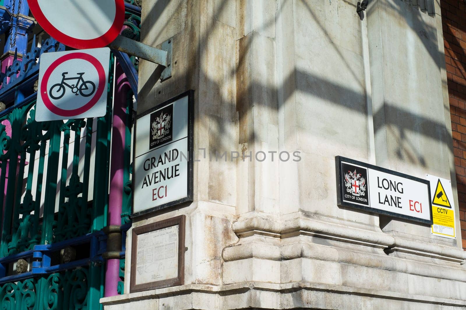 LONDON, UK - FEBRUARY 16: Detail of street signs in Smithfield meat market.The building is over one hundred and forty years old, but the market has been in the same site for almost one thousand years. February 16, 2014 in London.