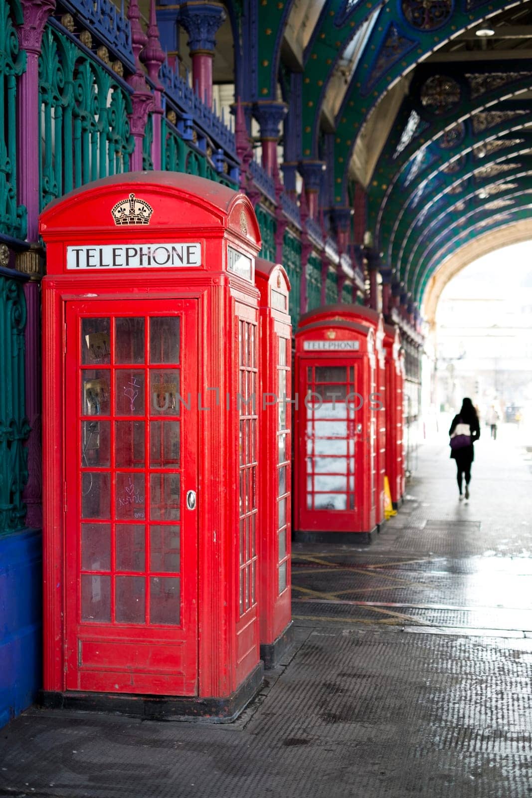 Old red telephone booth in Smithfield meat market in London, UK