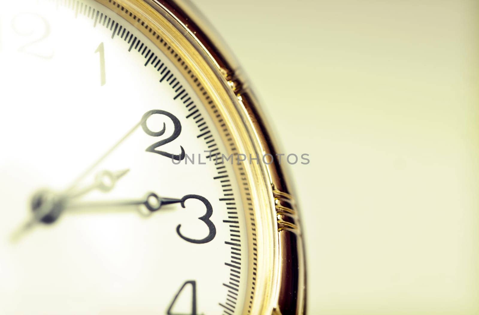 Old styled gold pocket watch on scarlet silk