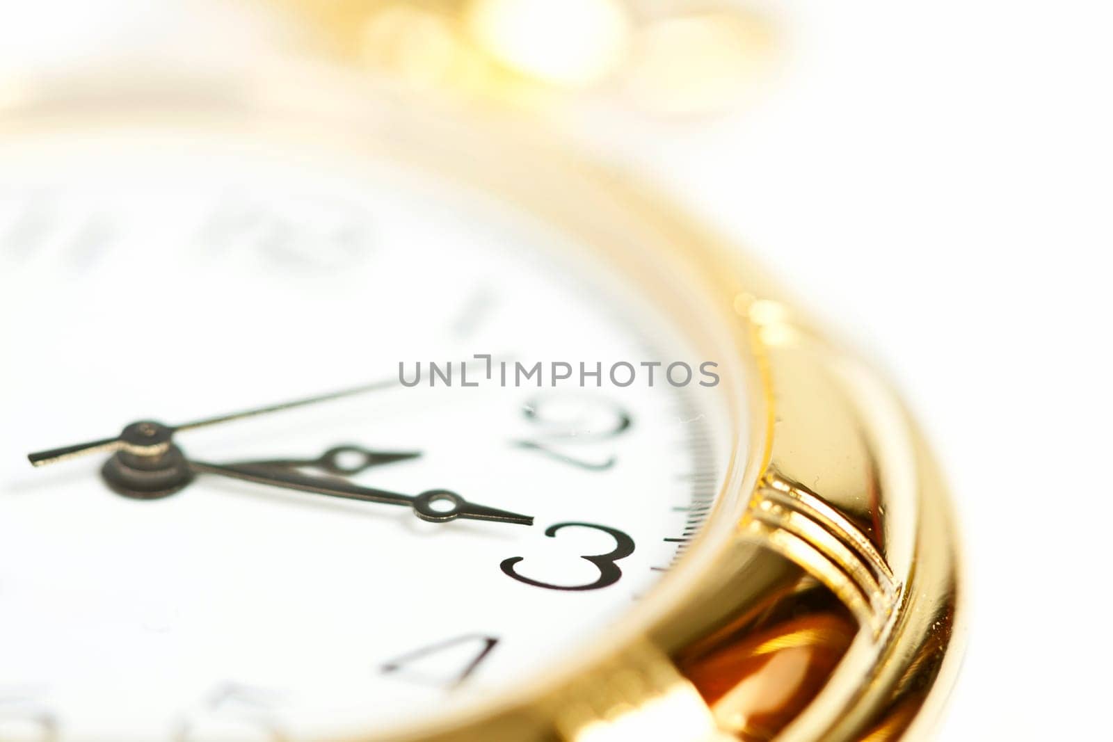 Old styled gold pocket watch on scarlet silk