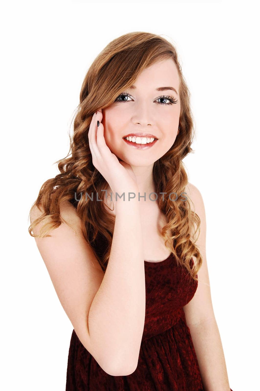 A closeup portrait picture of a young pretty teenager with long curly hair.and blue eyes, for white background..