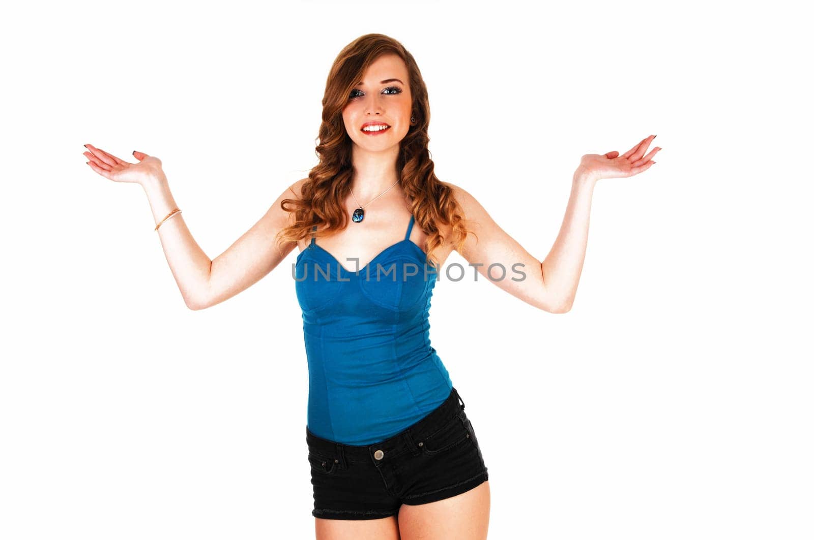 A portrait picture of a young pretty teenager with long curly hair.and blue eyes lifting up her arms, for white background..