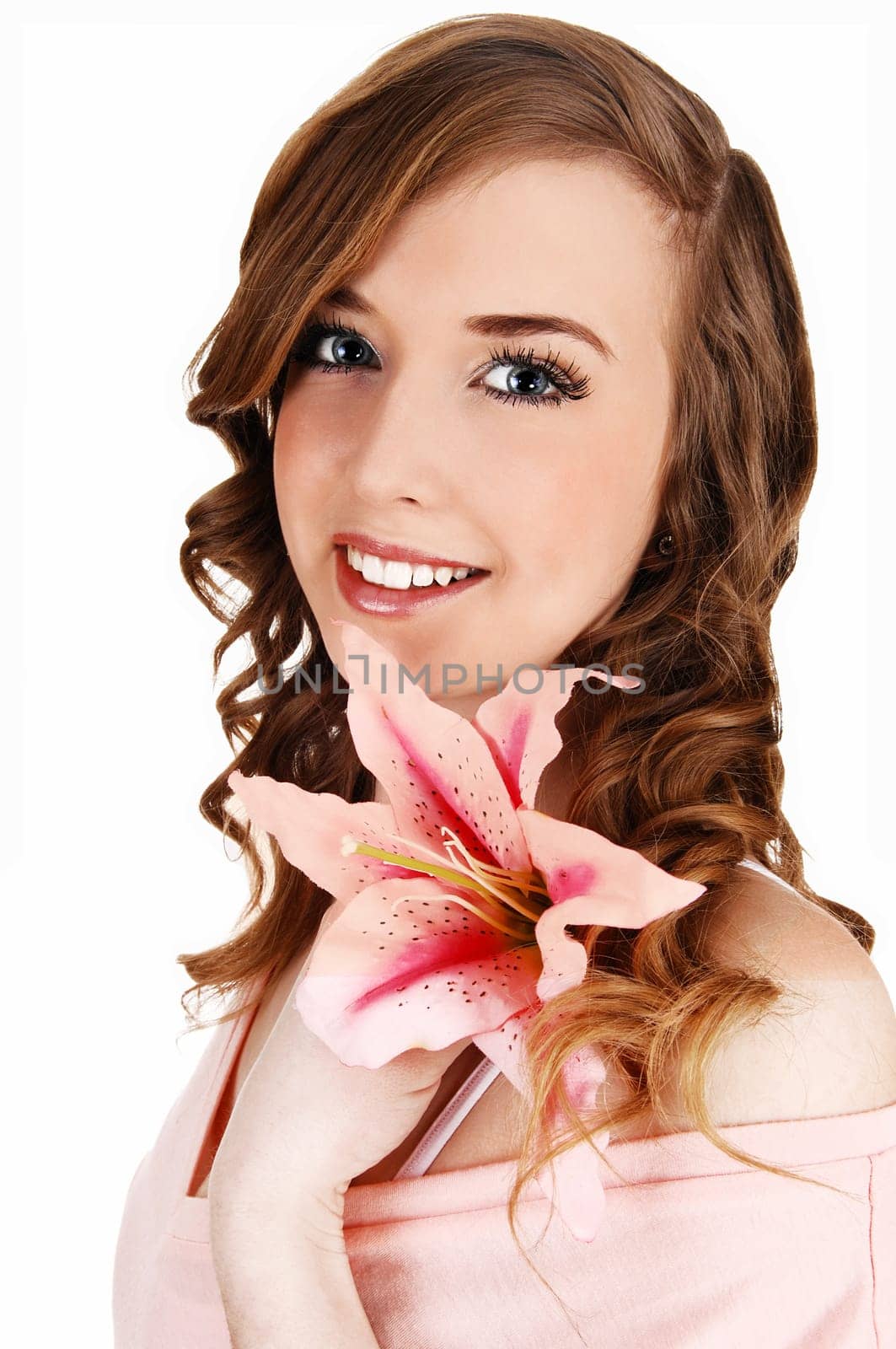 A closeup portrait picture of a young pretty teenager with long curly hair.and blue eyes, for white background..