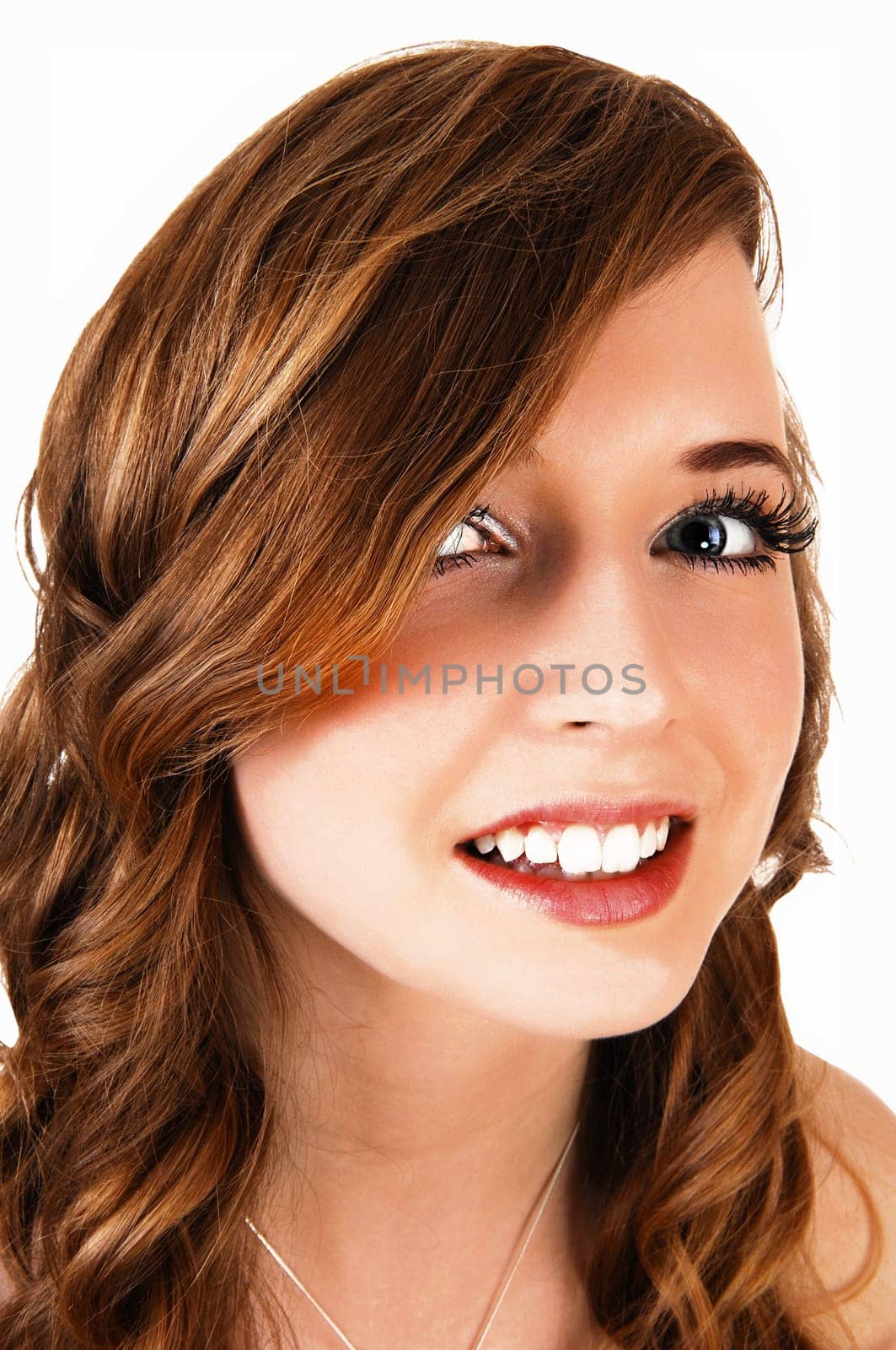 A closeup portrait picture of a young pretty teenager with long curly hair.and blue eyes, for white background..
