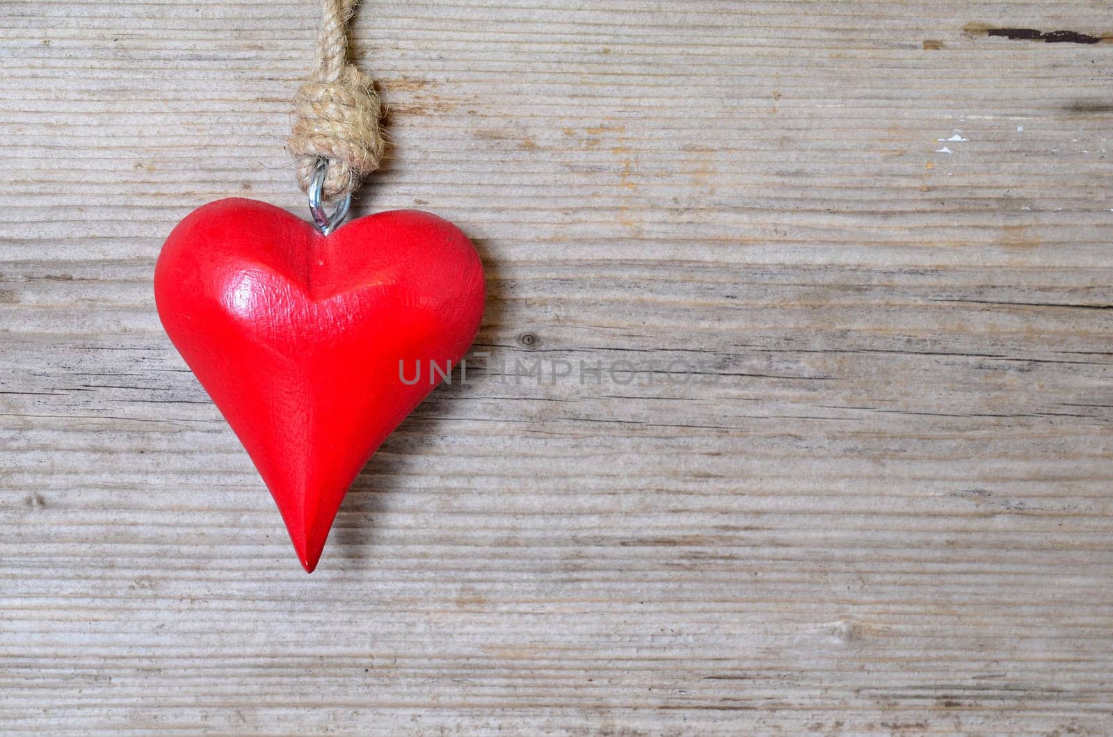 red heart on wood