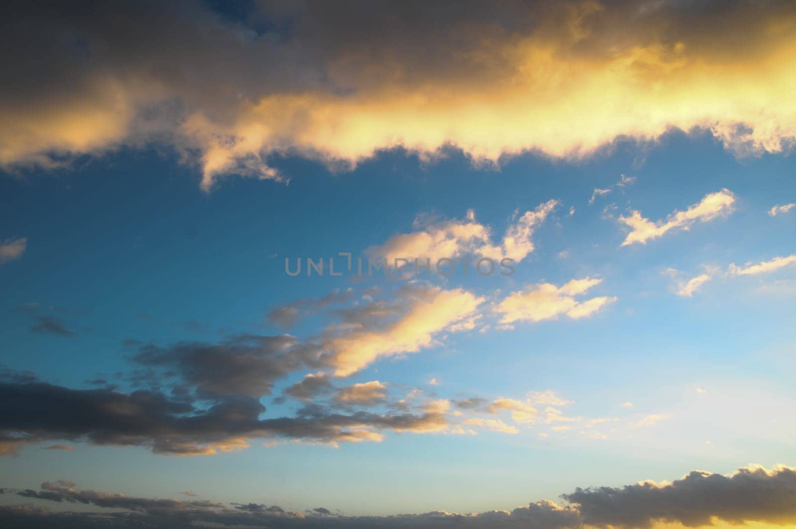 Cloudscape, Colored Clouds at Sunset near the Ocean