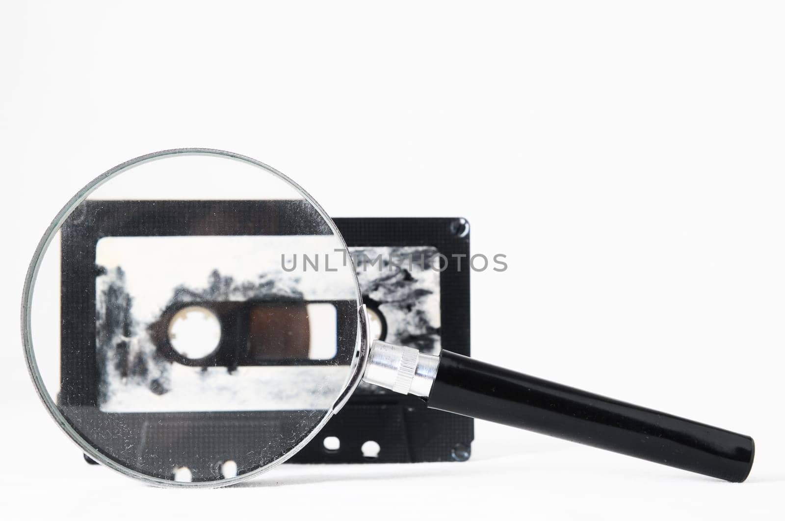 Ancient Vintage Used Musicassette over a White Background