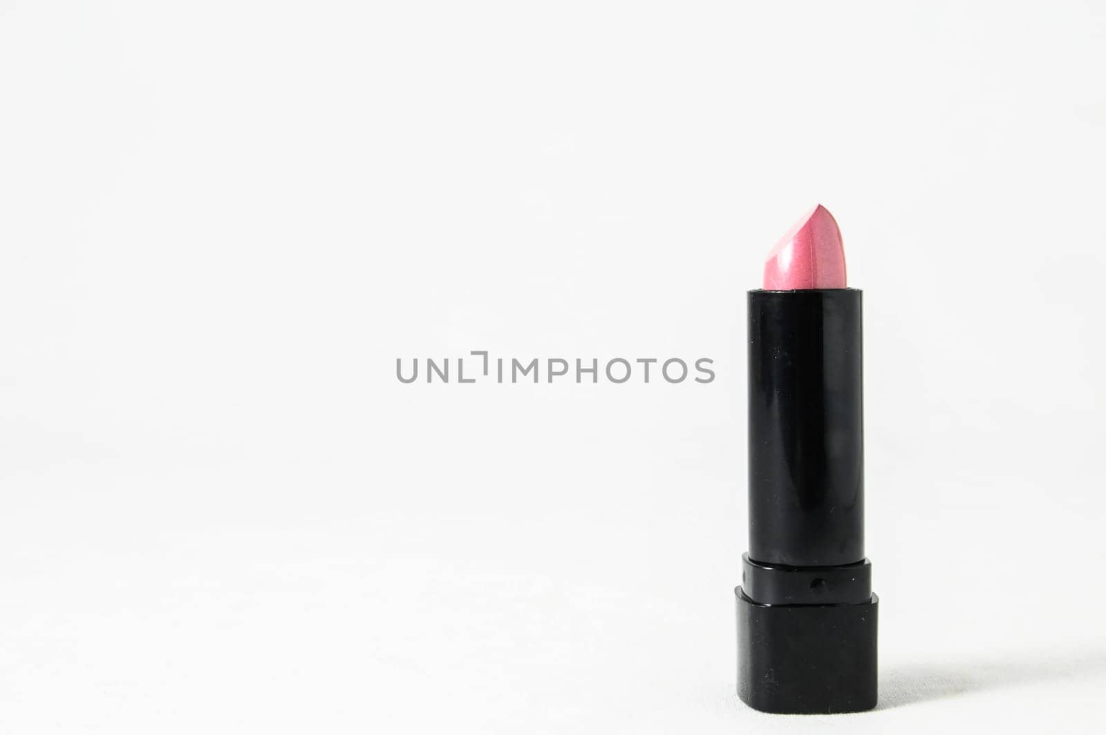 Lipstick in Black Container on a white background