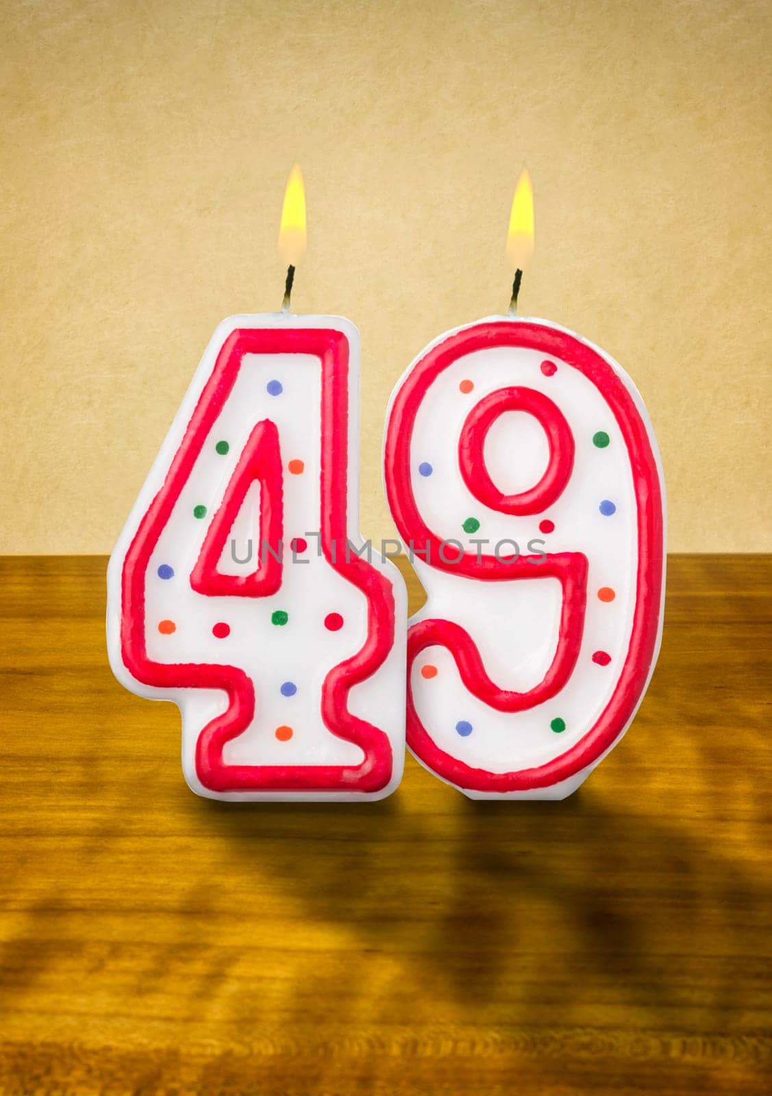 Burning birthday candles number 49