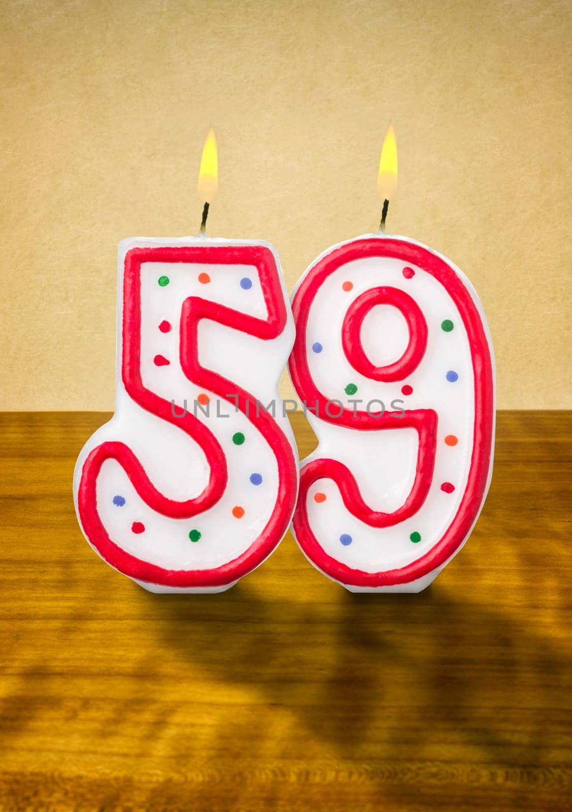 Burning birthday candles number 59