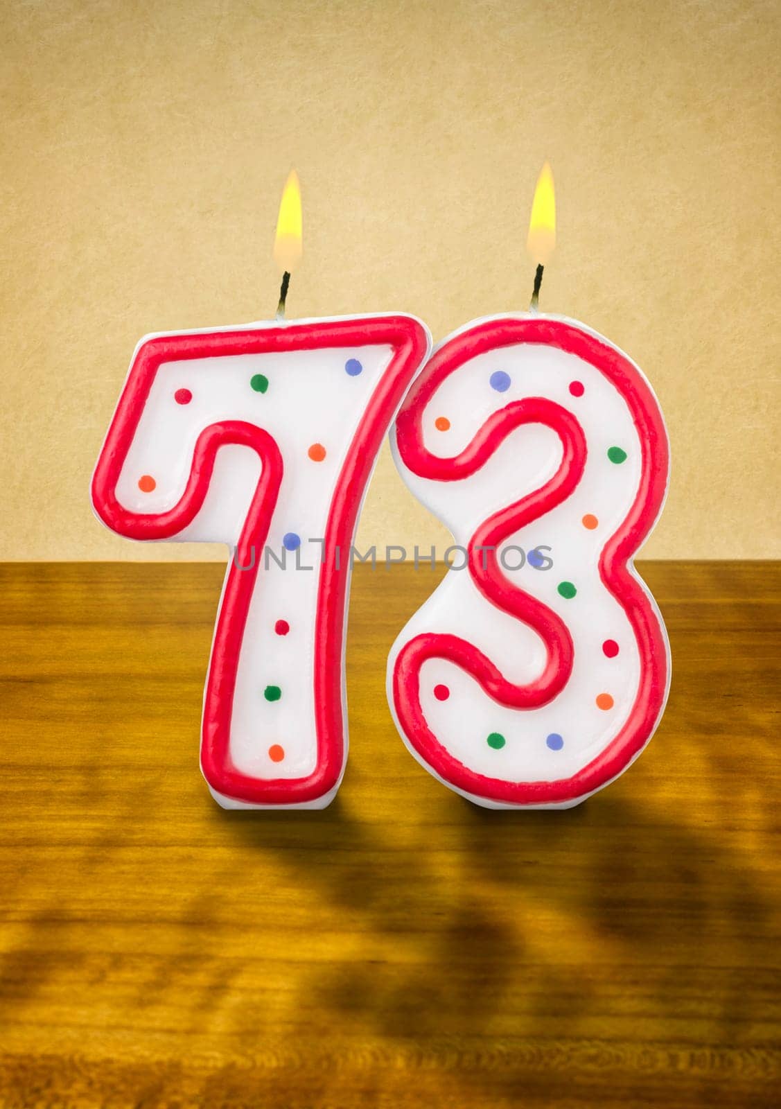 Burning birthday candles number 73