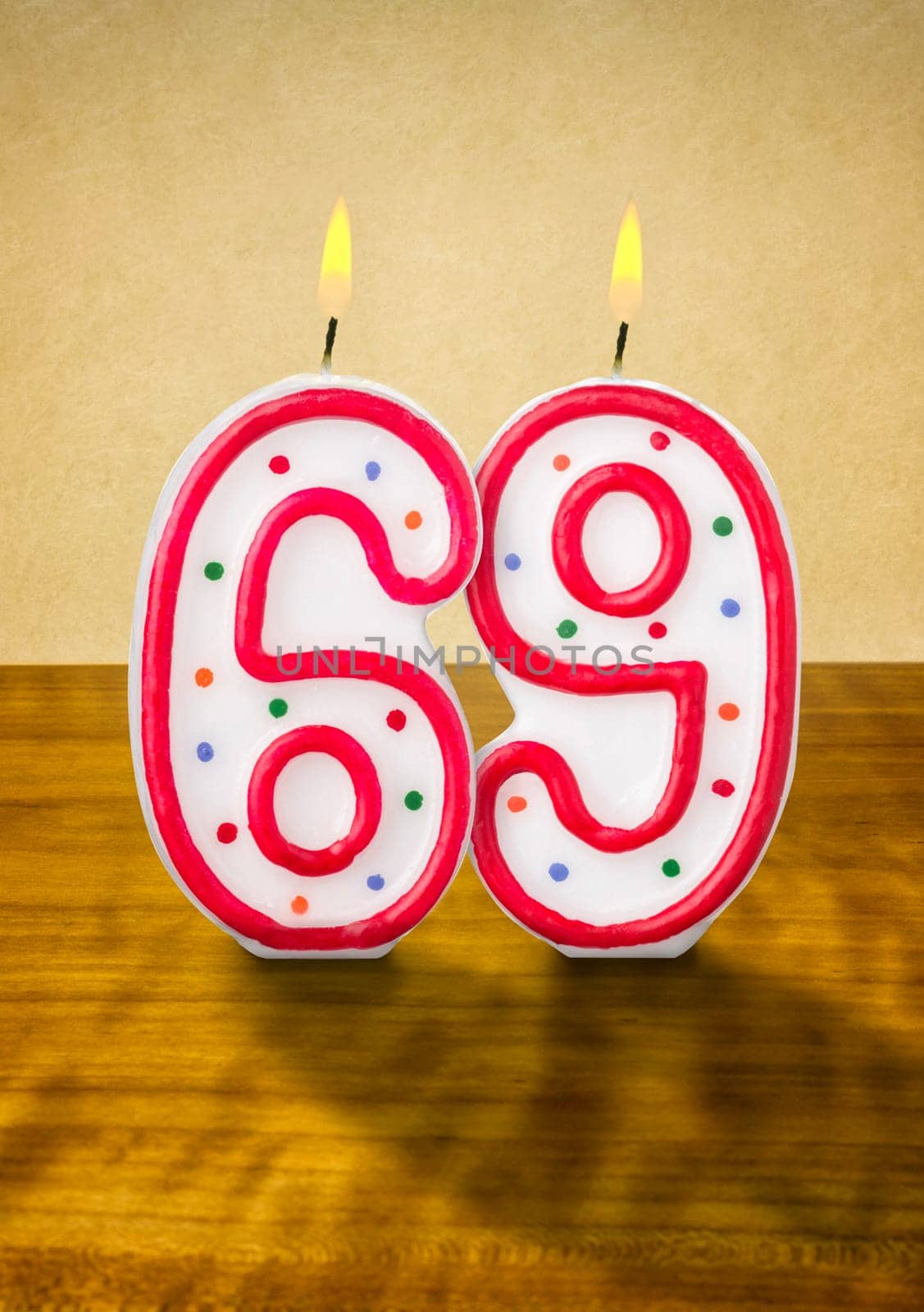 Burning birthday candles number 69