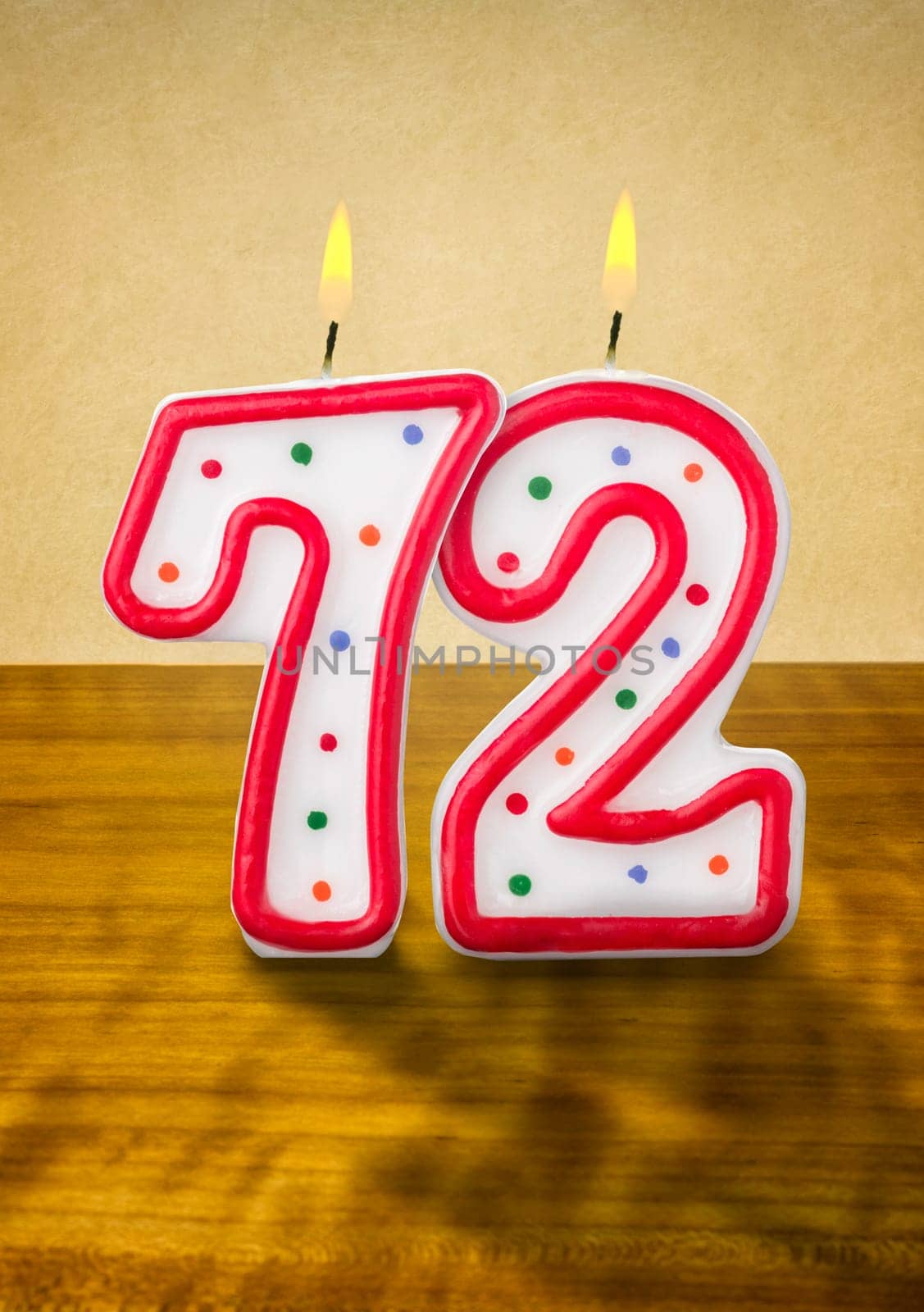 Burning birthday candles number 72