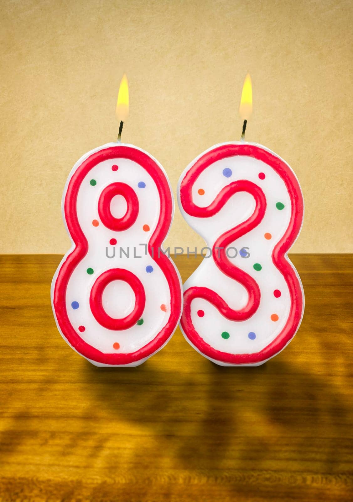 Burning birthday candles number 83
