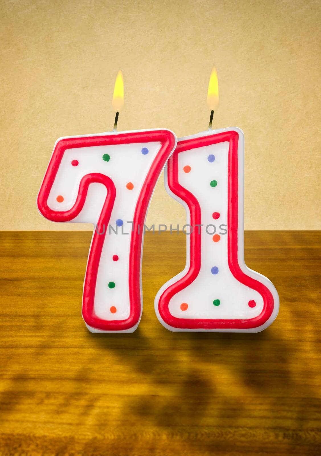 Burning birthday candles number 71