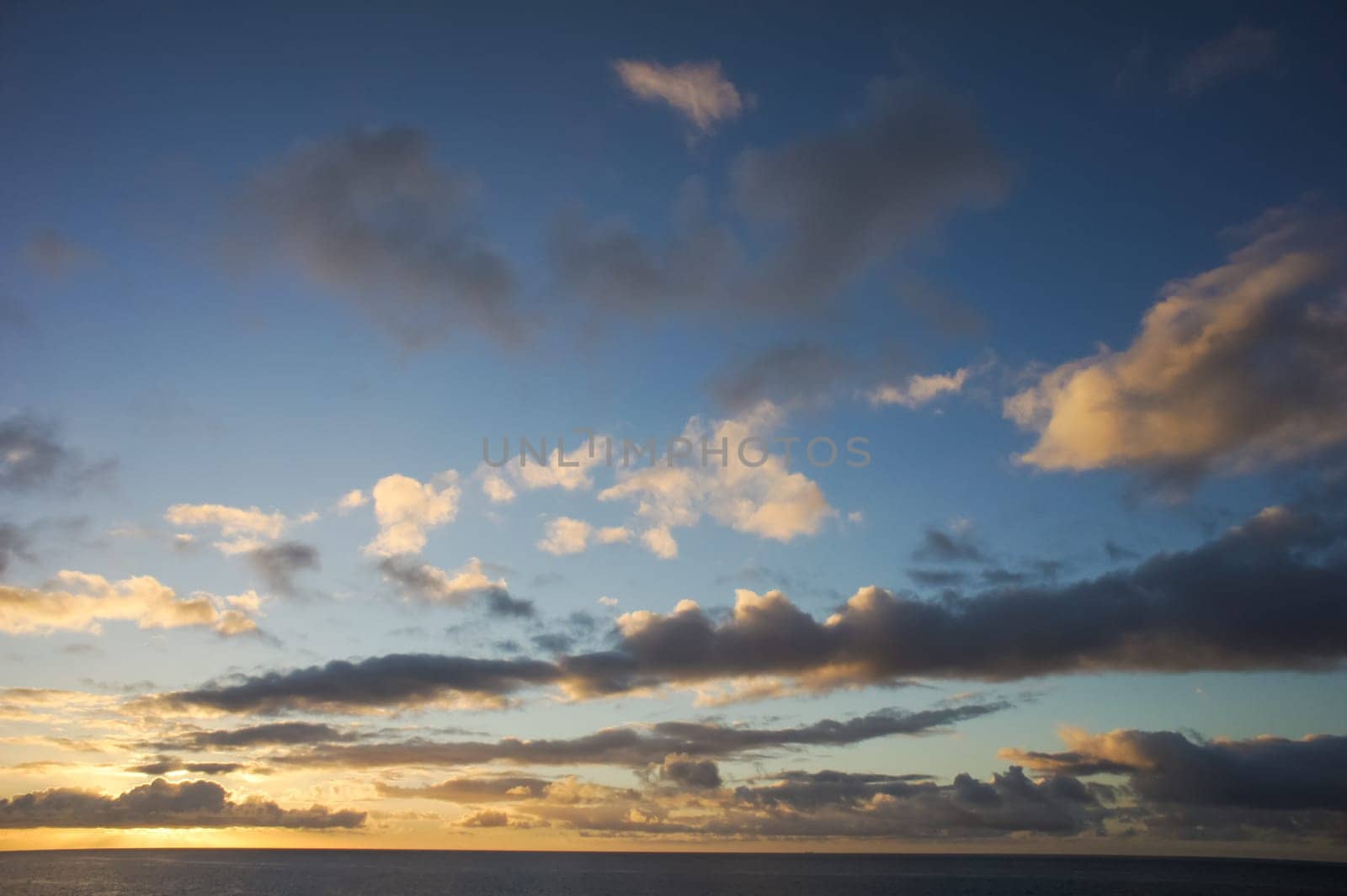 Colred Sunrise Clouds over the Atlantic Ocean in Tenerife Canary Islands