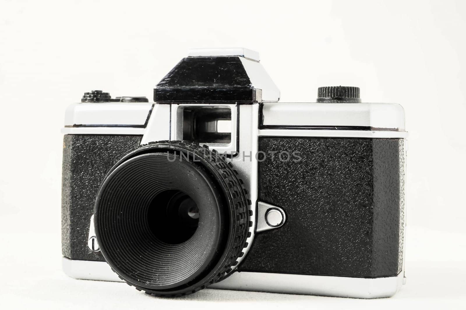 Classic 35mm Plastic Toy Photo Camera on a White Background