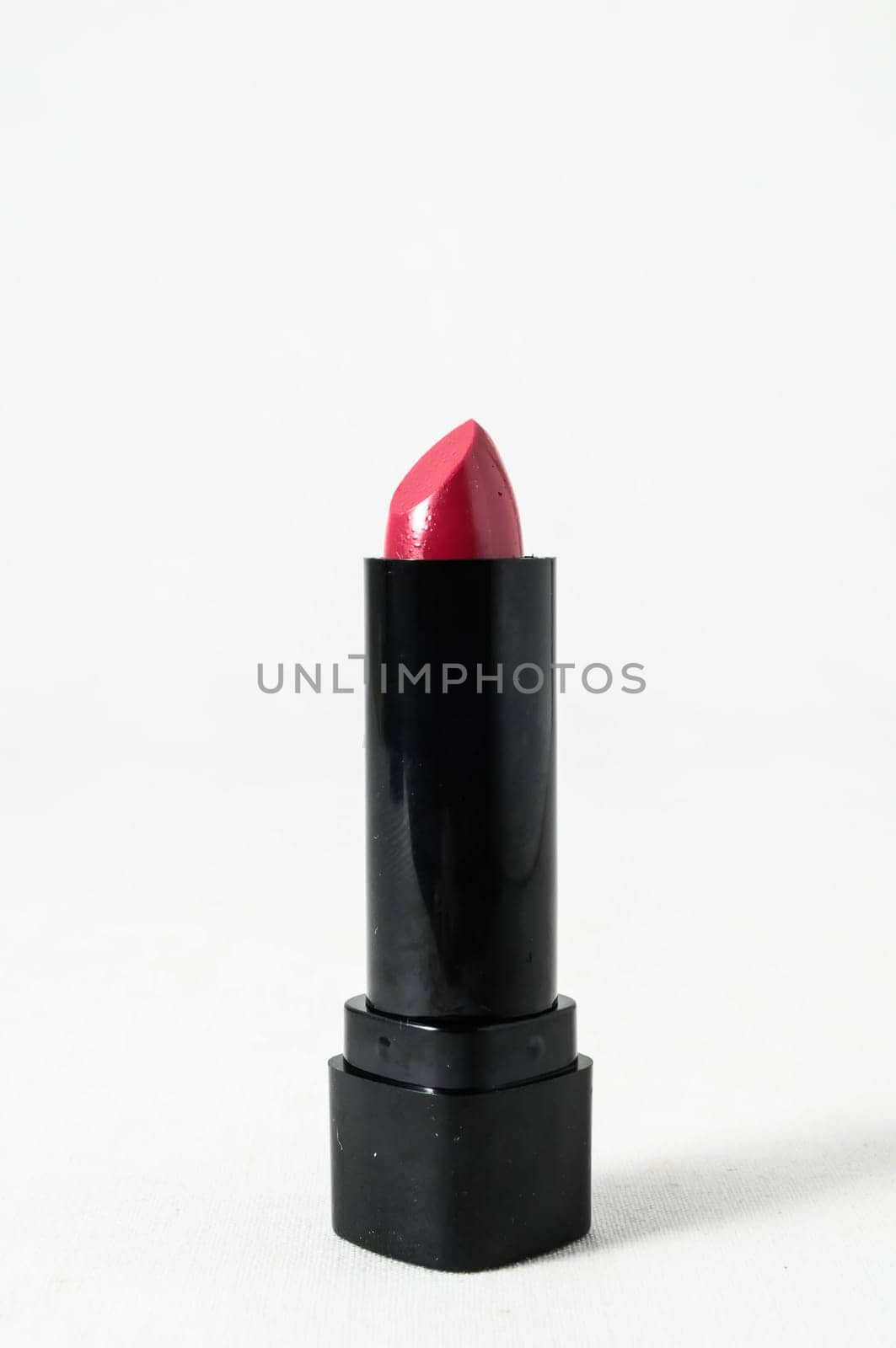 Lipstick in Black Container on a white background