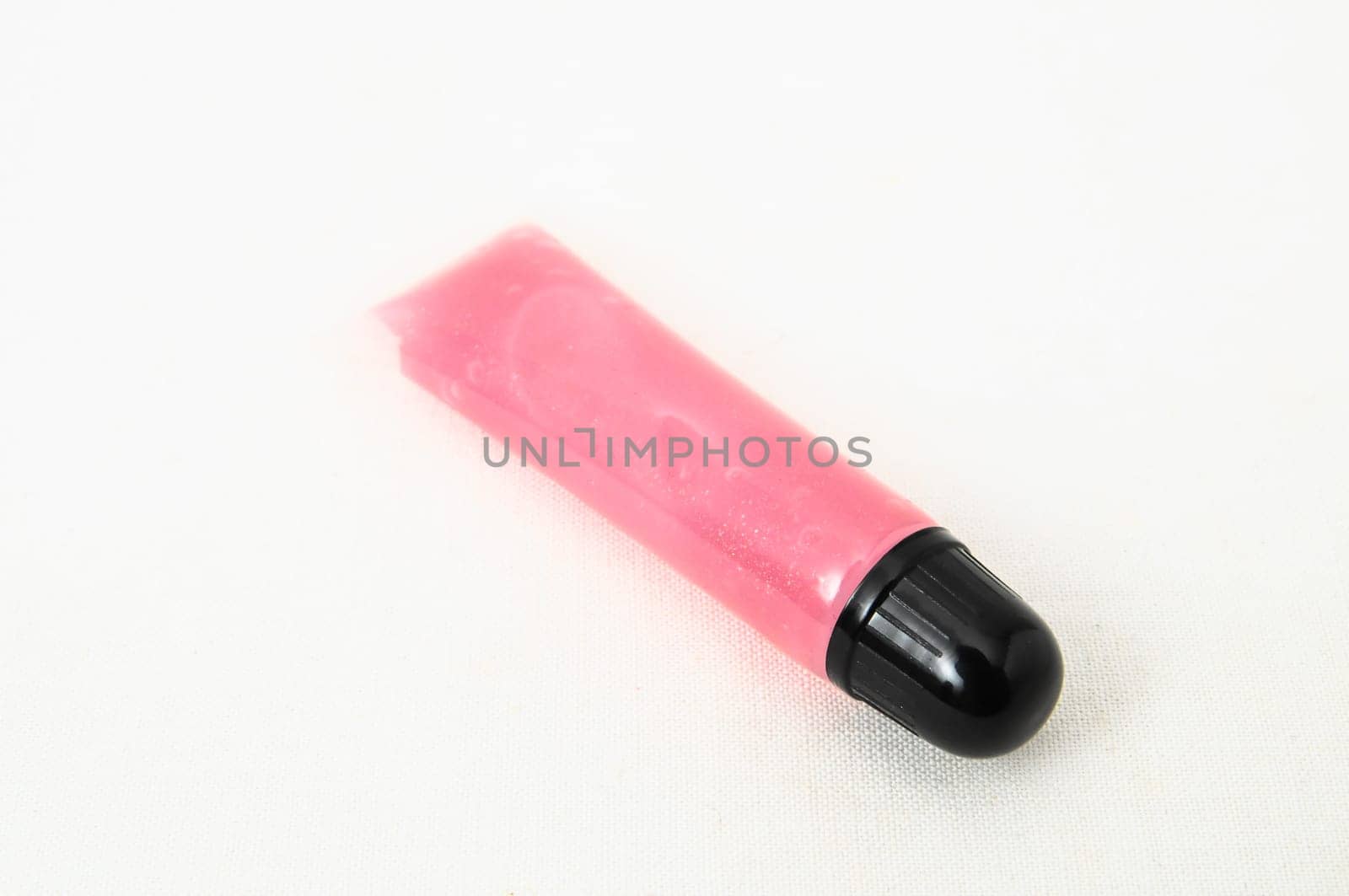 Lipstick in Black Container on a white background