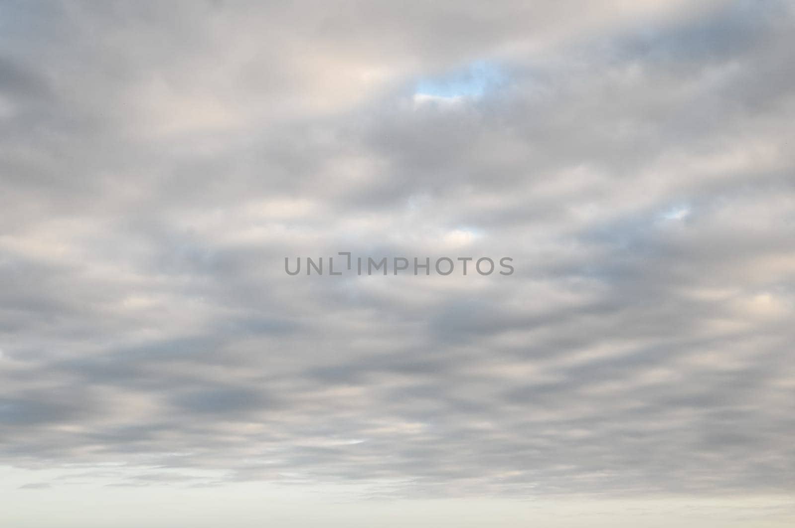 Cloudscape, Colored Clouds at Sunset near the Ocean