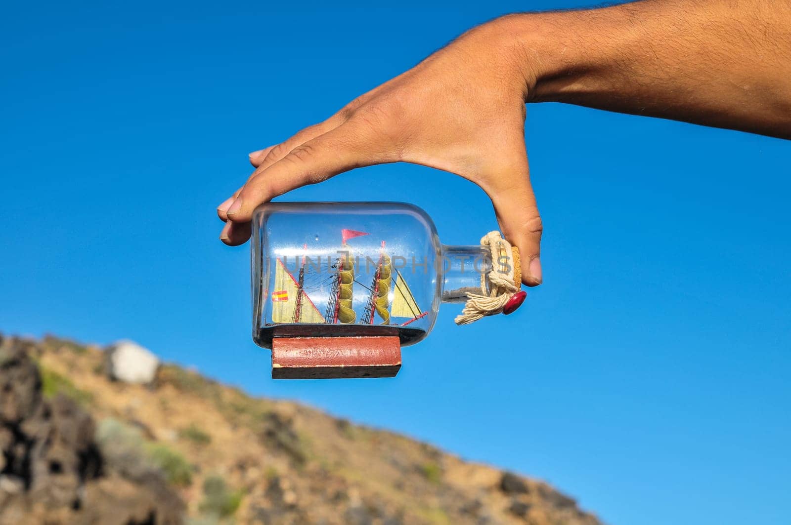 Sailing Boat Vintage Vessel on a Caucasian Hand