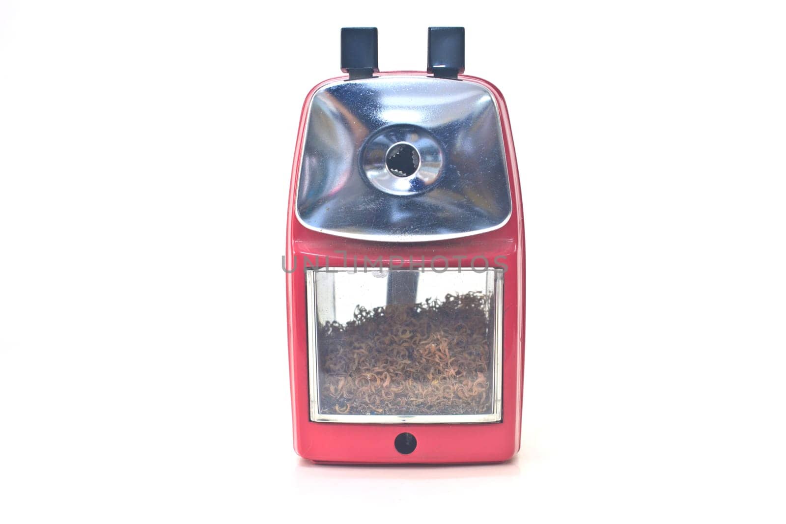 red pencil sharpener on white background