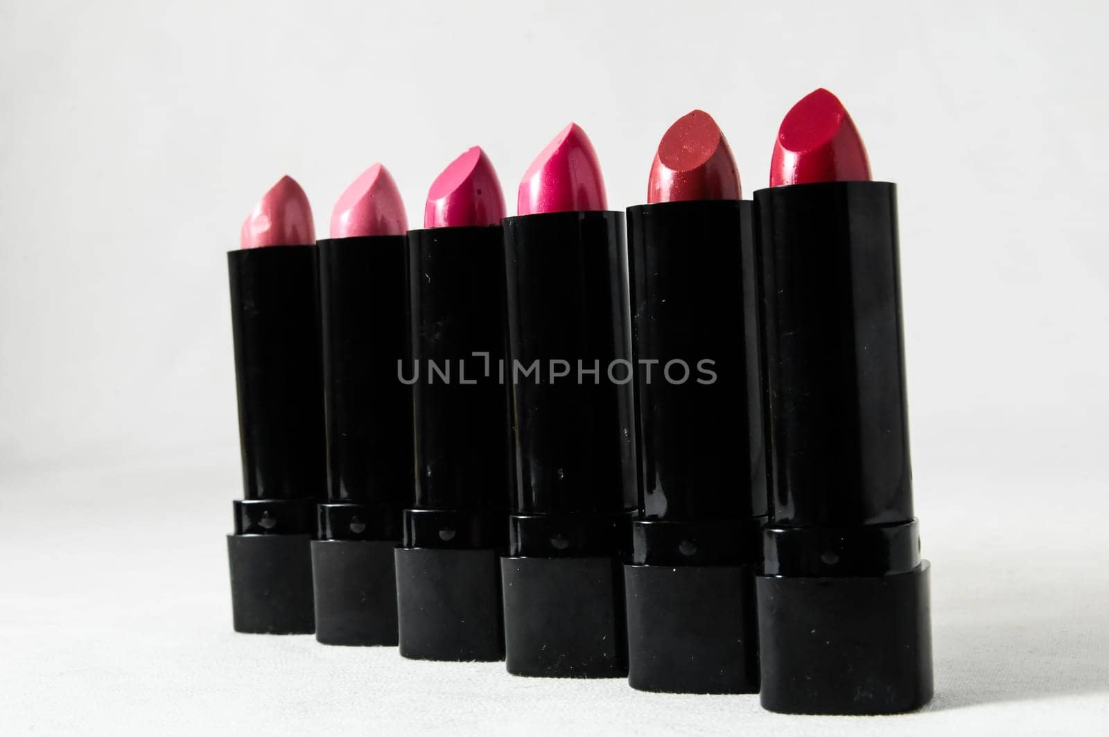 Lipstick in Black Container on a white background