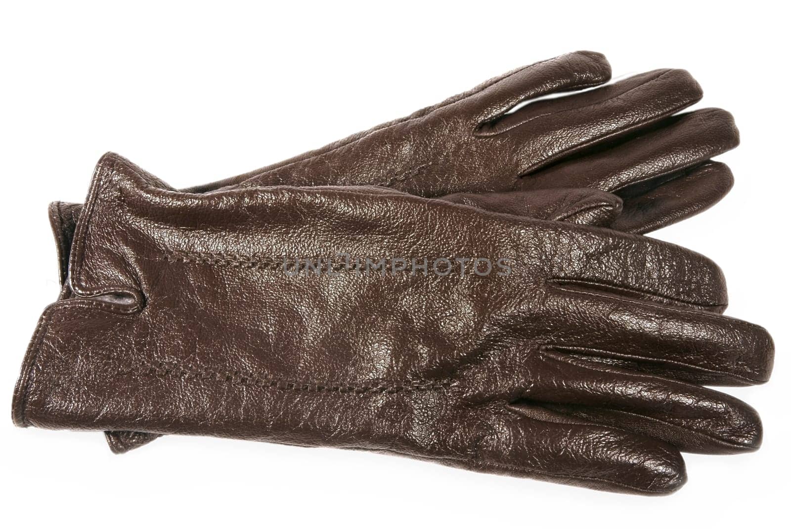 Pair of l brown  leather gloves isolated on white background