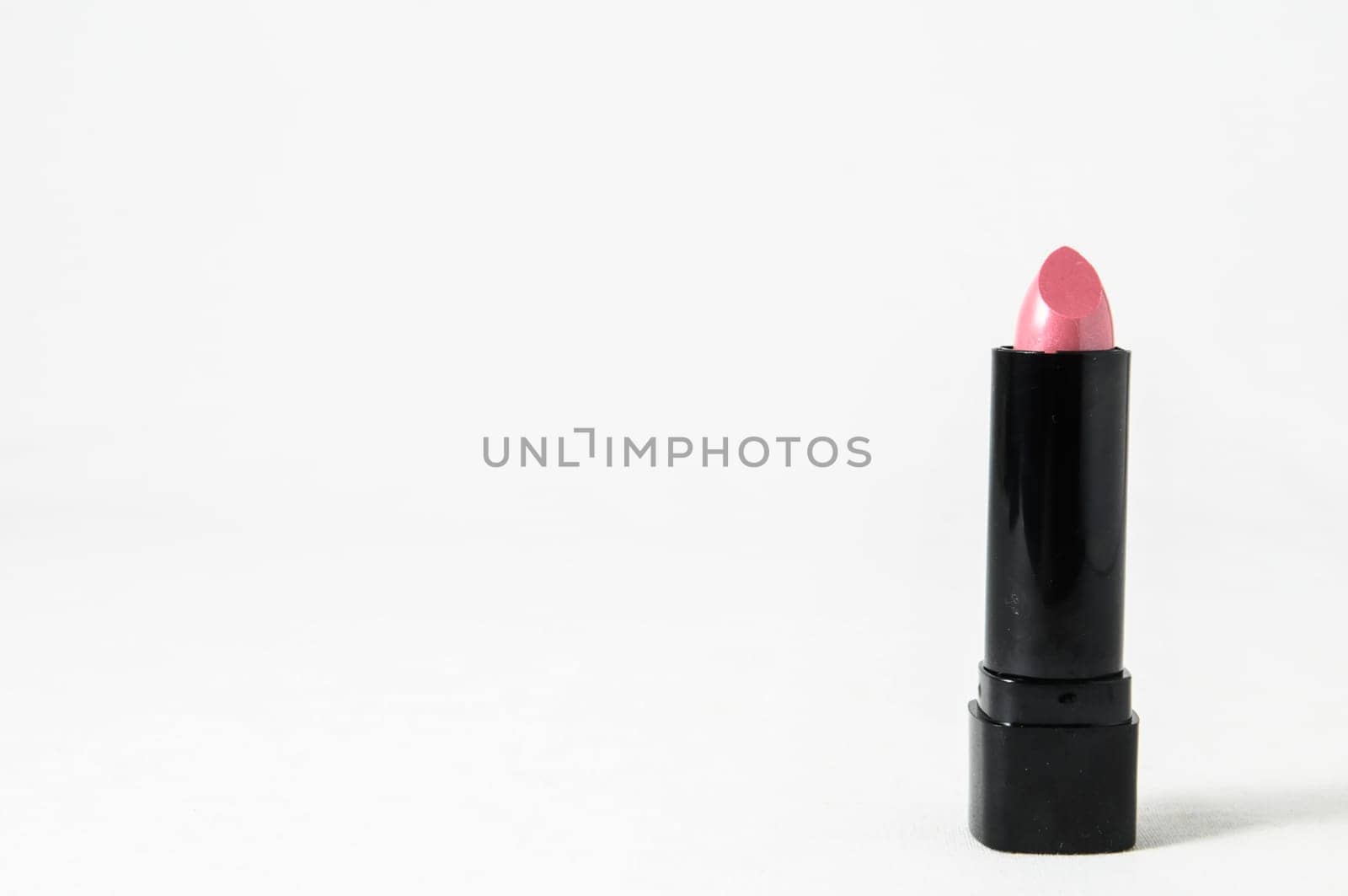 Lipstick in Black Container on a white background