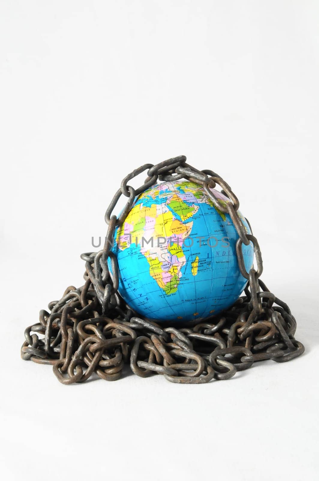Earth globe close in chain and padlock