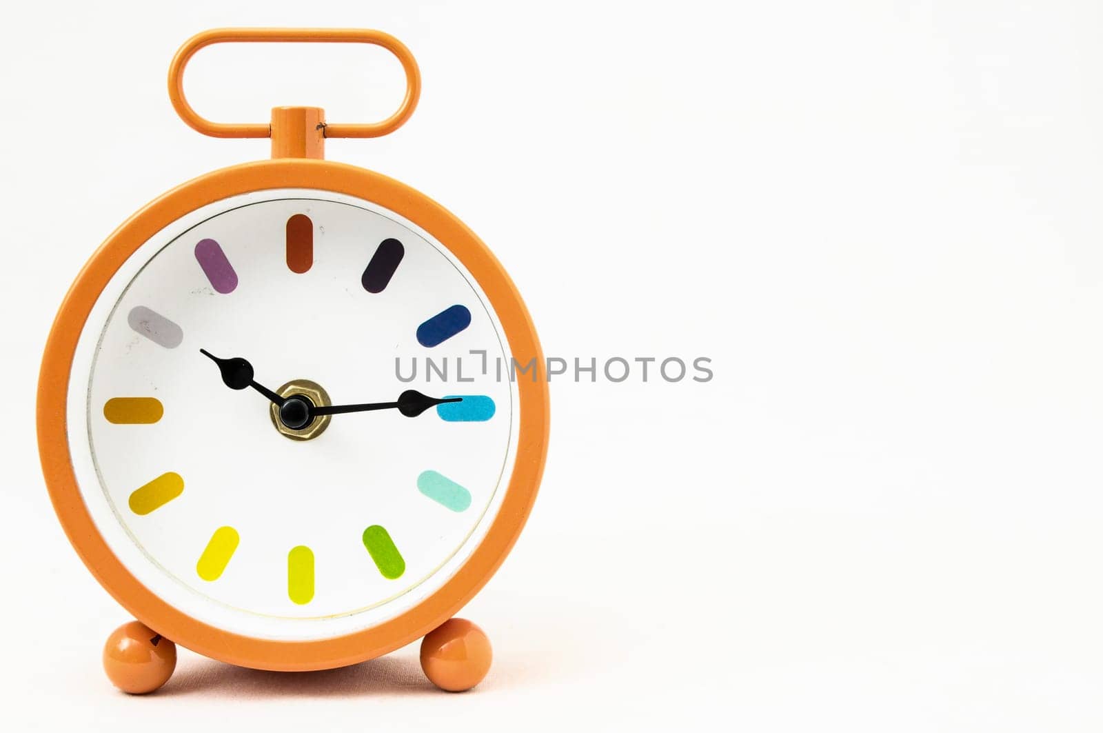 Orange Alarm Clock on a White Background