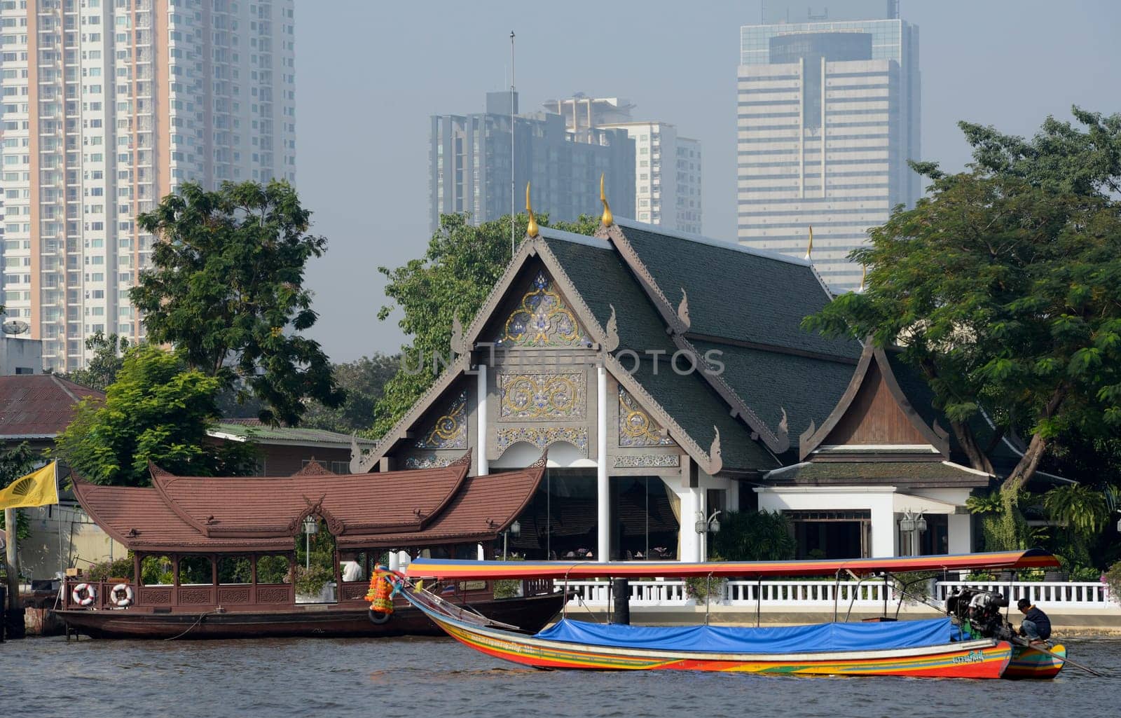 A boat on the Mae Nam Chao Phraya River in the capital Bangkok of Thailand in South East Asia.
