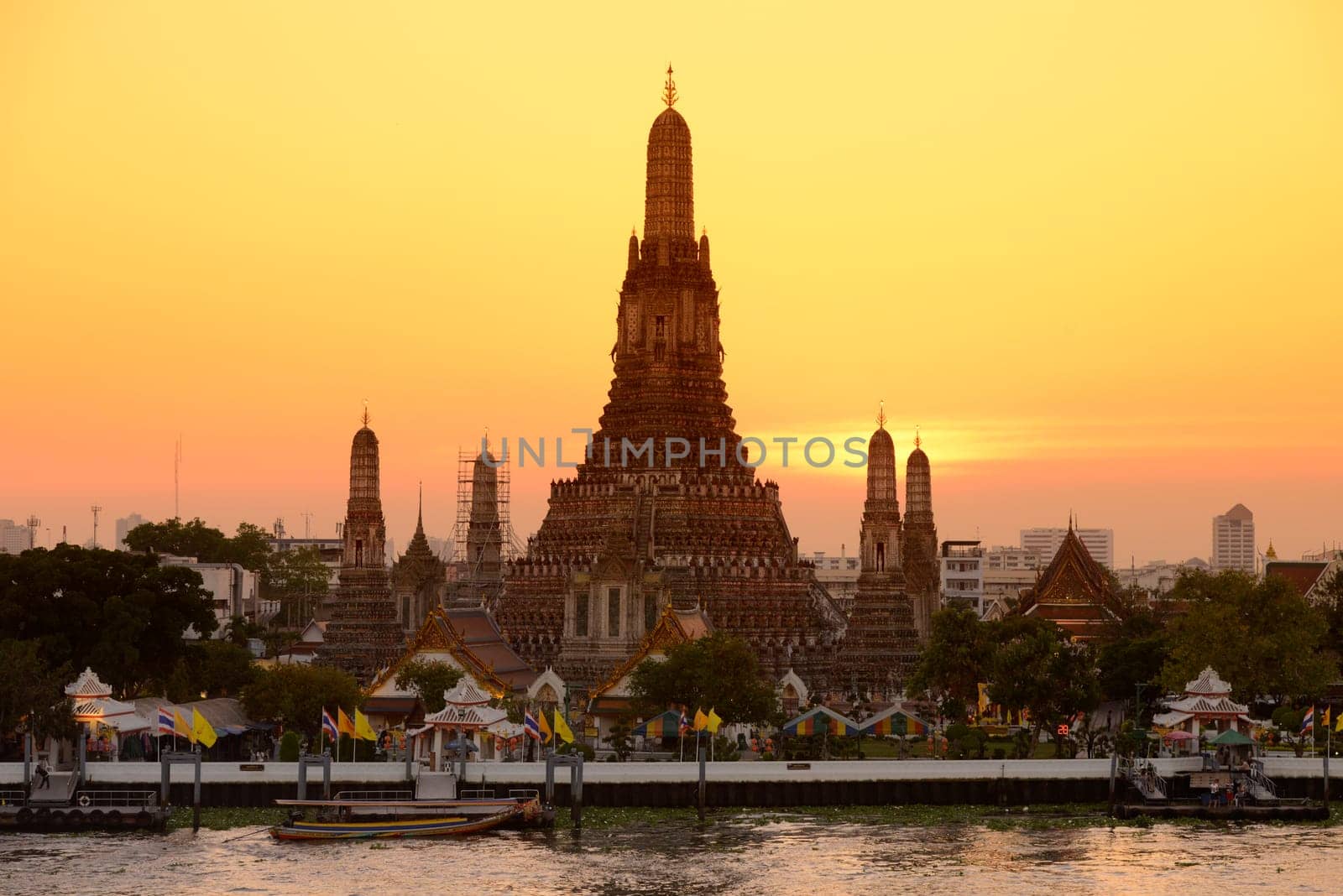 The temple complex of Wat Arun on the Mae Nam Chao Phraya River in the capital Bangkok of Thailand in South East Asia.