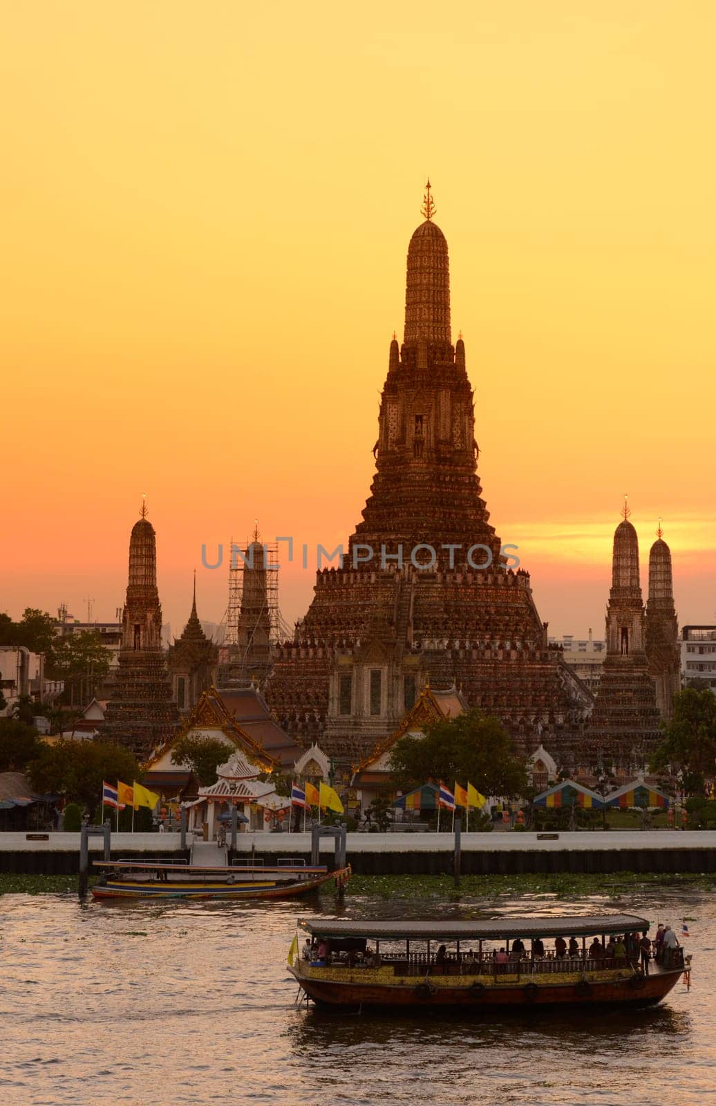 The temple complex of Wat Arun on the Mae Nam Chao Phraya River in the capital Bangkok of Thailand in South East Asia.