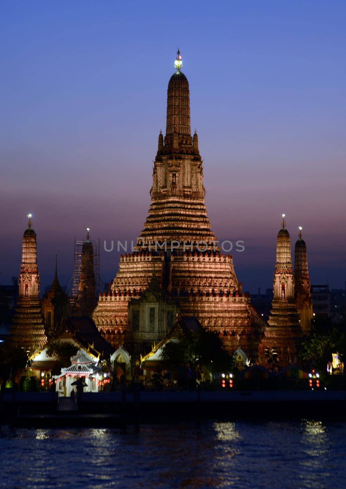 The temple complex of Wat Arun on the Mae Nam Chao Phraya River in the capital Bangkok of Thailand in South East Asia.