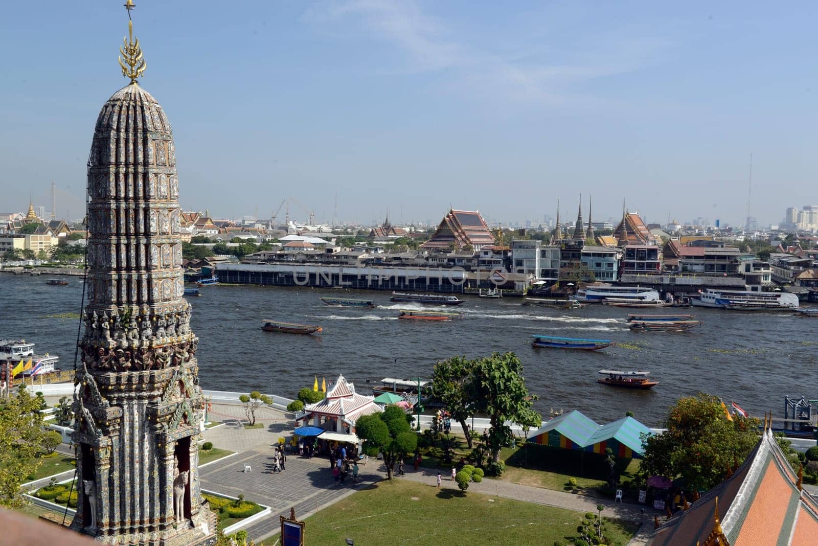 The temple complex of Wat Arun on the Mae Nam Chao Phraya River in the capital Bangkok of Thailand in South East Asia.